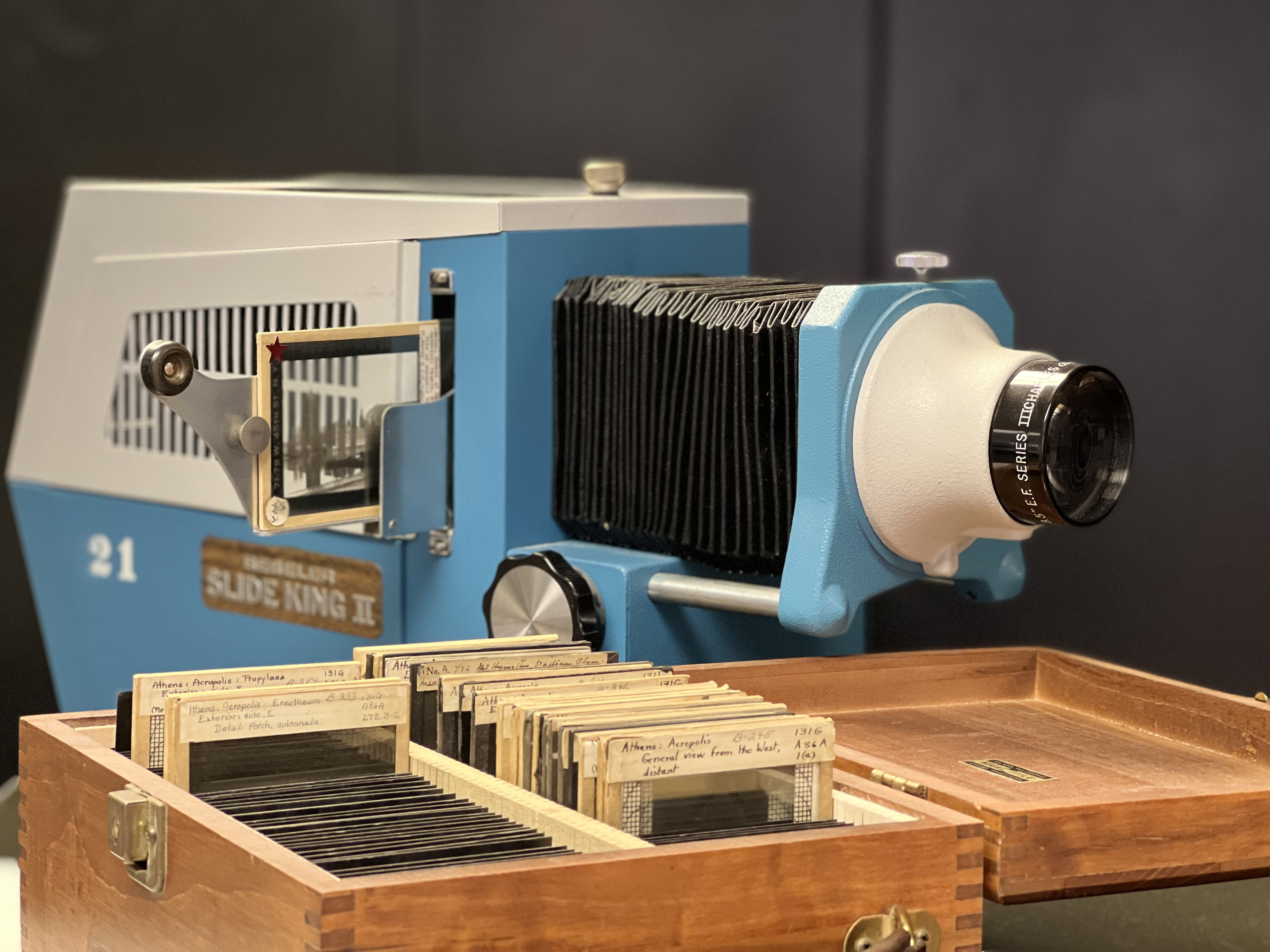 click to see item Lantern slides and projector